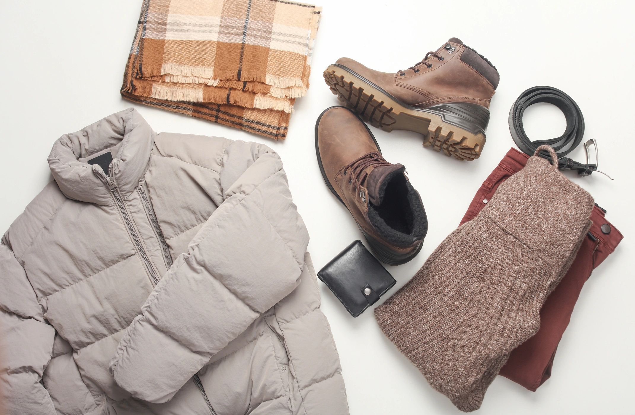 Folded menswear items laid out flat